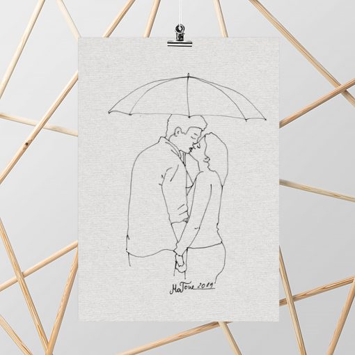 obraz całująca się para pod parasolem